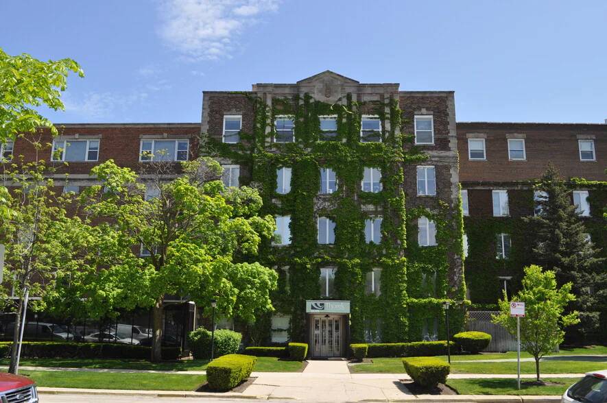 Chicago office, ivy-covered historic building at 5015 N Paulina St